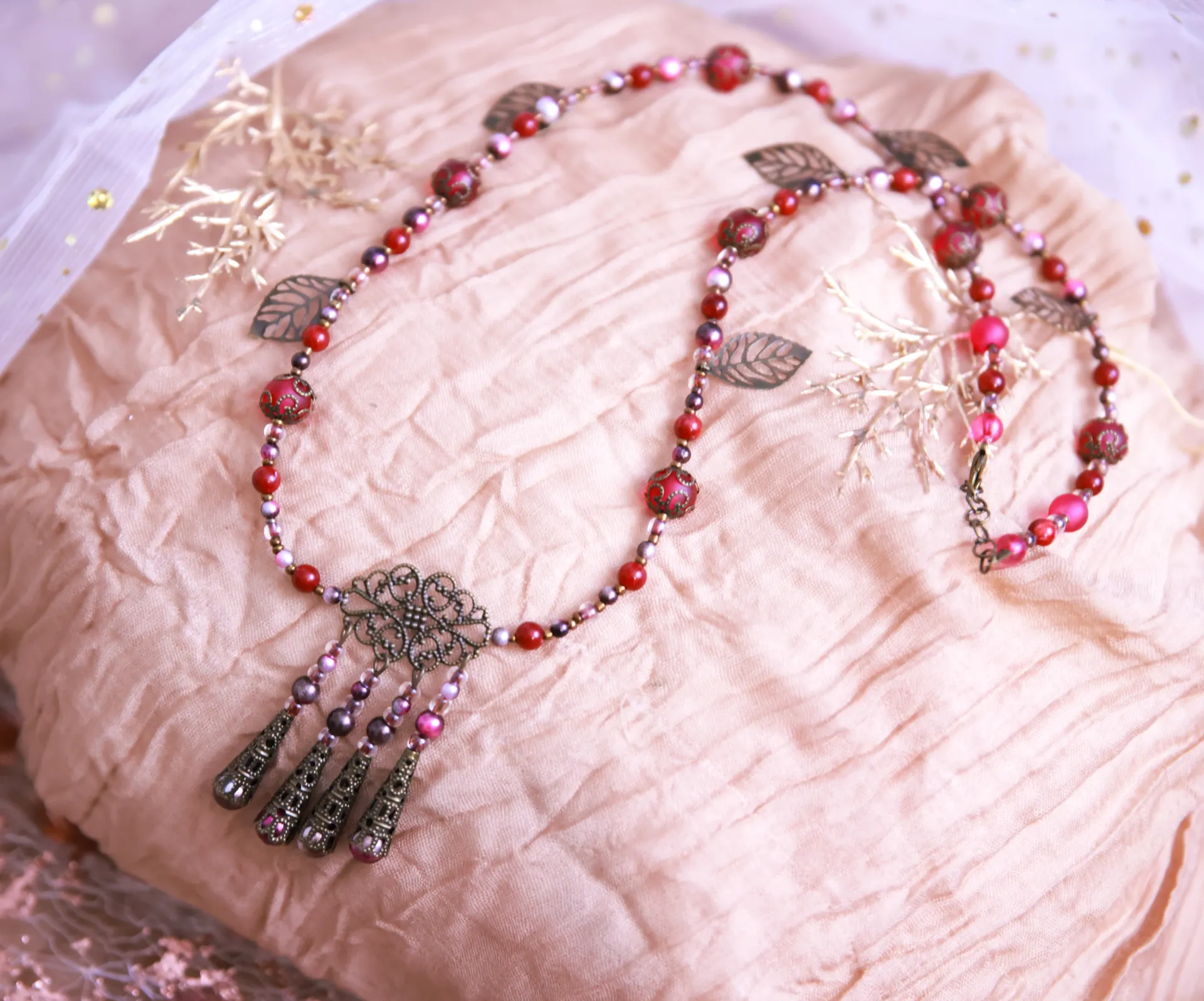 Collier perles rouges/bronze